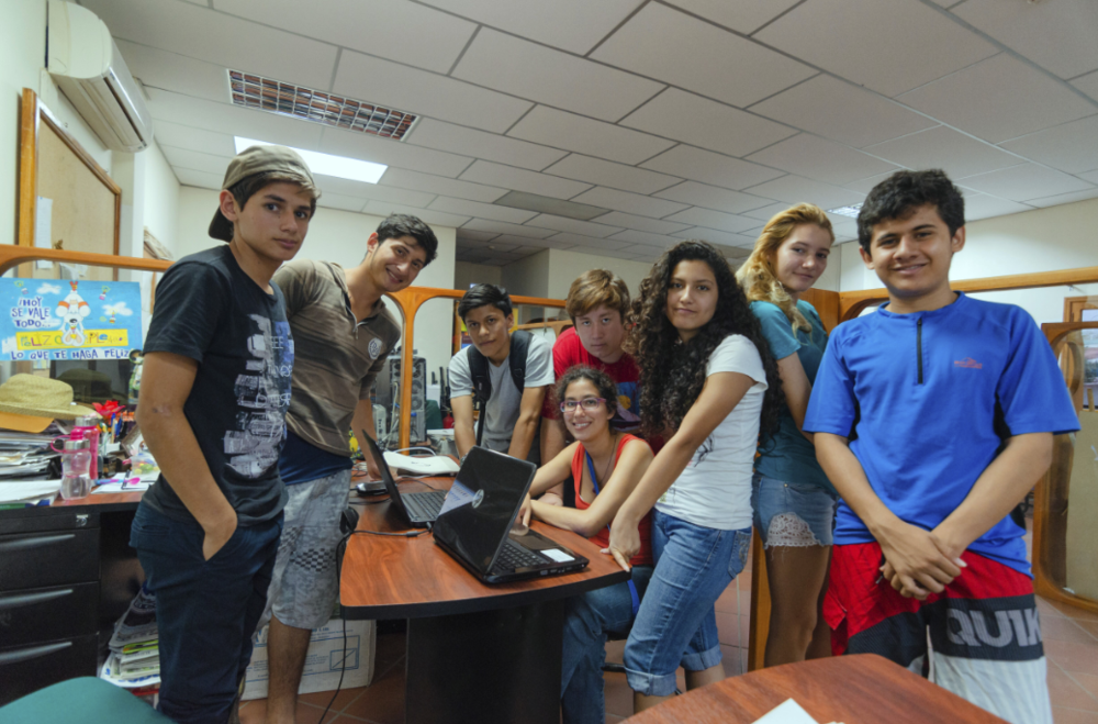 Figure 2. A meeting of the first cohort of Young Photographers of Galapagos in 2014. Photo: Diego Bermeo